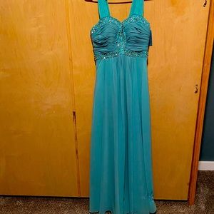 Blue bedazzled prom gown